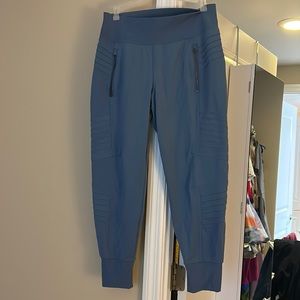 Athleta Light Blue Joggers with zipper pockets on front and back